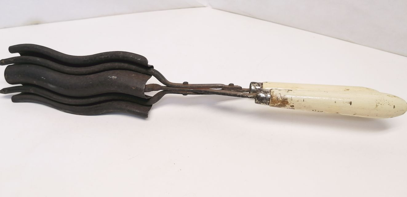 Régi fodrász kézi készülék haj hullámosító